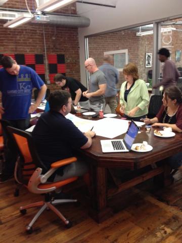 Workshop Wednesday - people around a busy table