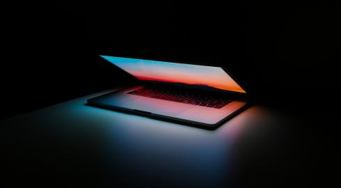 Laptop powering up in the dark